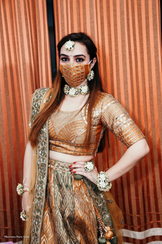 Copper mask with geometric net mesh design and copper brown lehenga