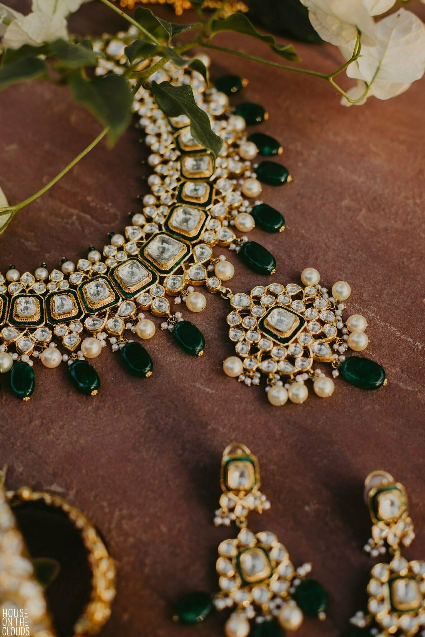 golden and green jewellery