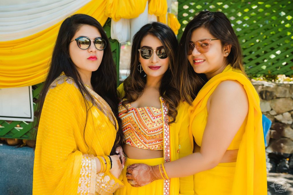 bridesmaid and bride haldi ceremony outfit ideas | WedAbout