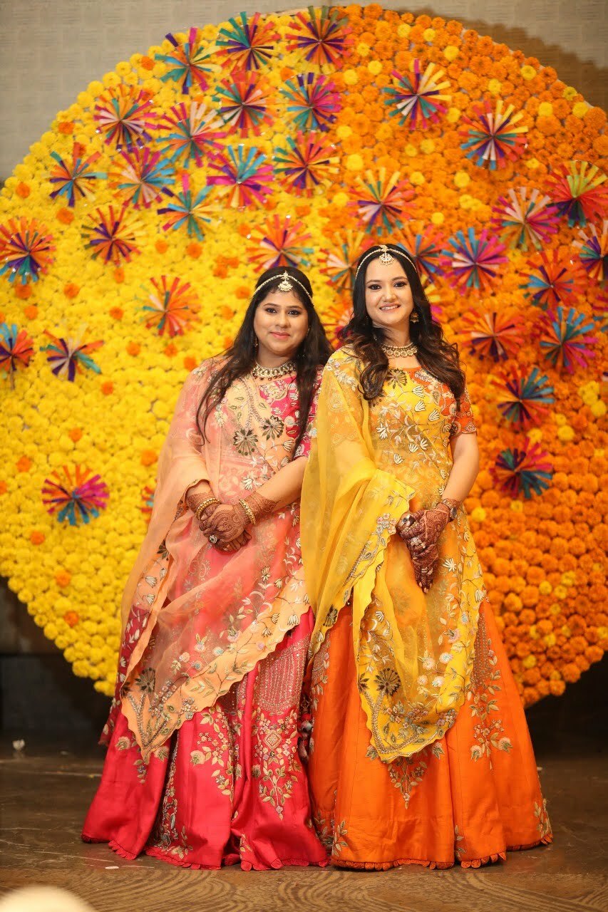 circular marigold haldi backdrop decor | WedAbout