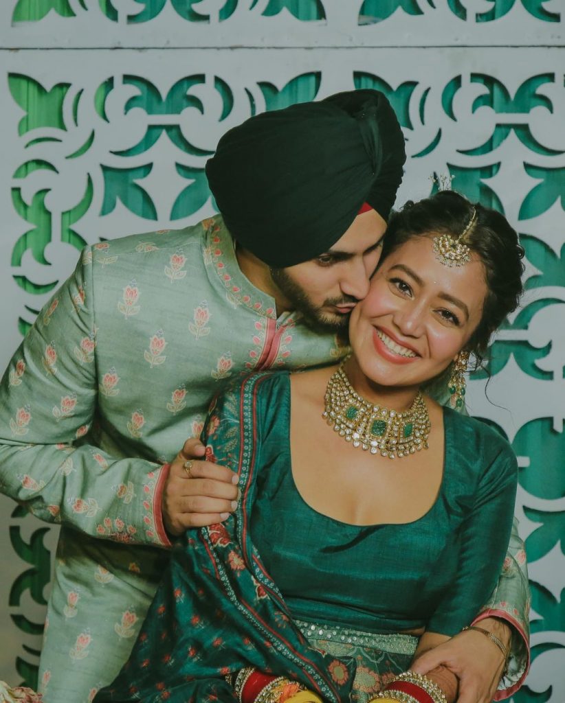 couple neha and rohanpreet in green outfits or mehendi 