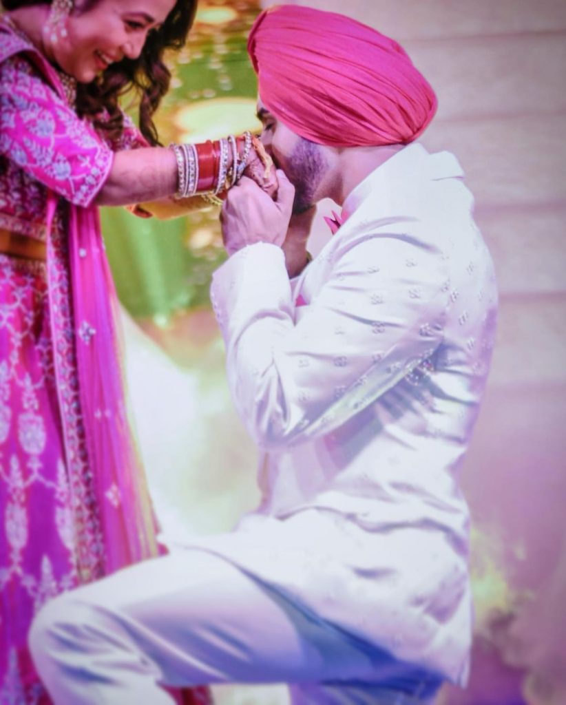 Adorable candid of rohanpreet kissing neha's hands during ring ceremony