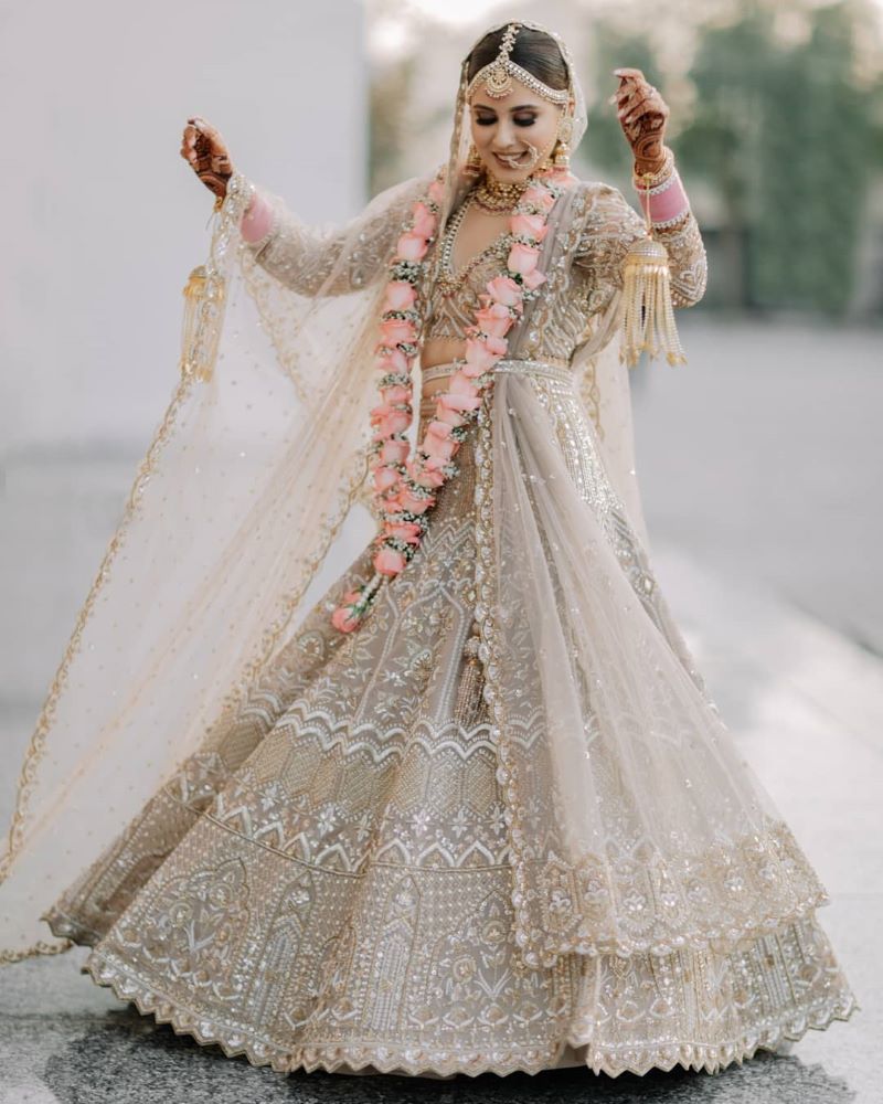 White Wedding Photoshoot & Poses Photo white and gold bridal lehenga