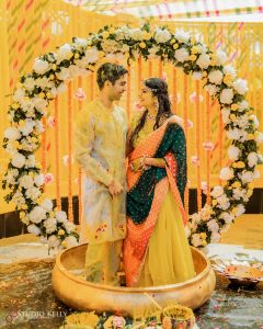 background-haldi-ceremony-decoration-floral-backdrop- | WedAbout