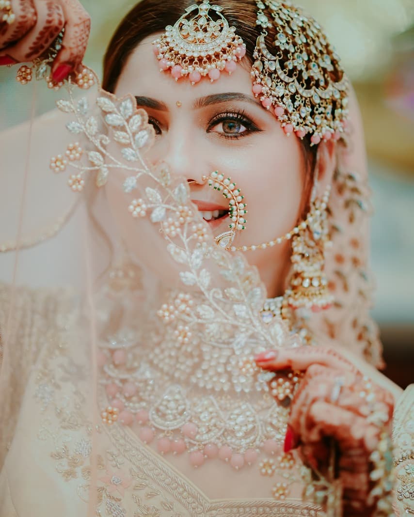 Magnificent Young Indian Bride in Luxurious Bridal Costume with Makeup and  Heavy Jewellery is Sitting in a Chair in with Classic Stock Image - Image  of lehenga, hindu: 208379389