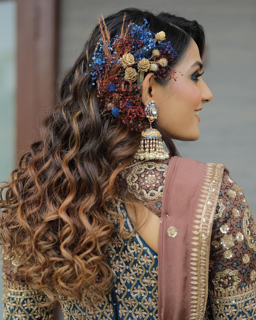 latest voluminous curls indian reception bridal hairstyle