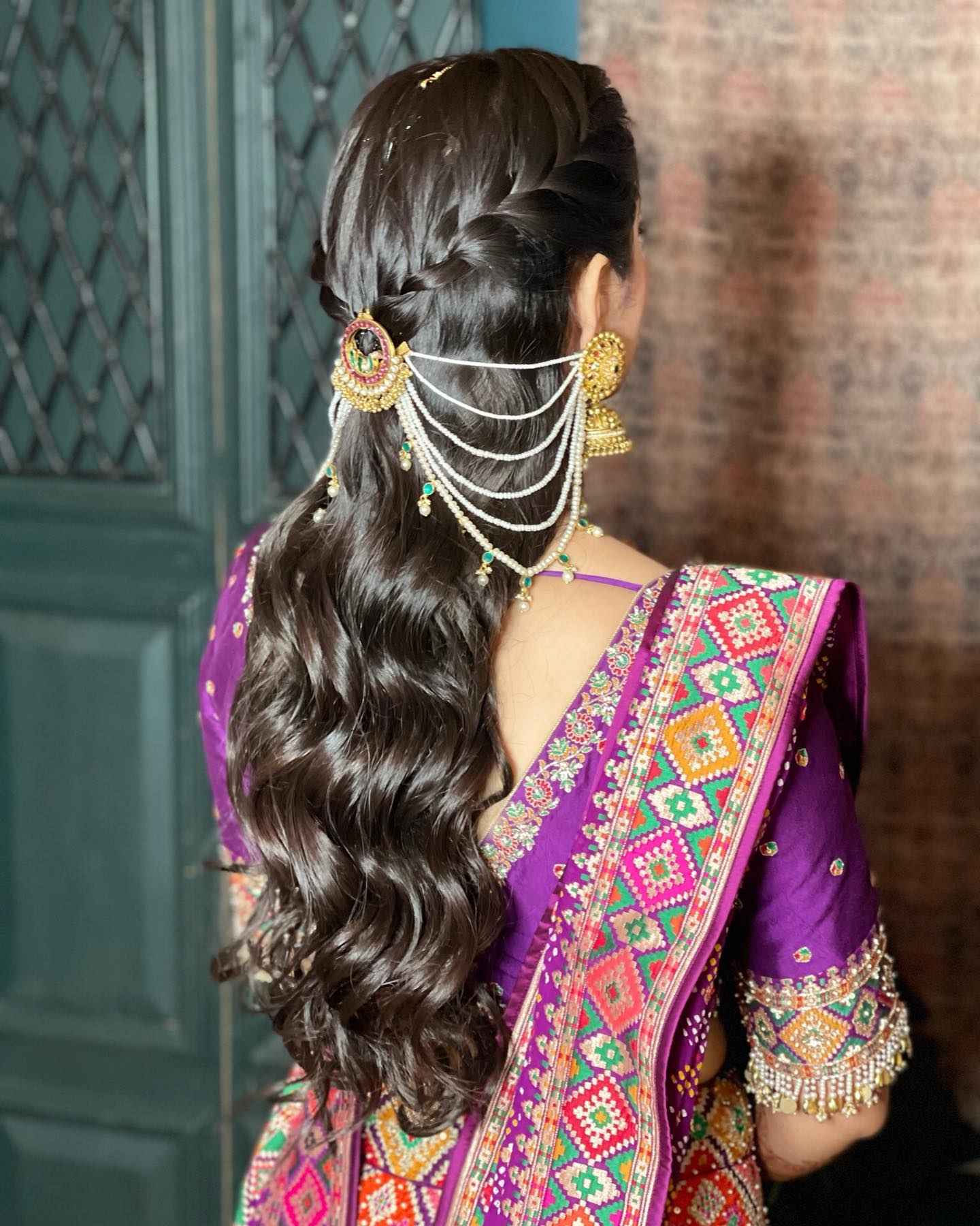 modern south indian bridal hairstyle for engagement and reception