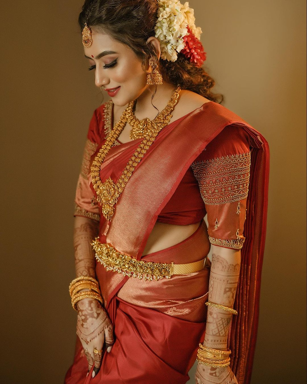 south-indian-bridal-look-in-red-Kanjeevaram-silk-saree | WedAbout