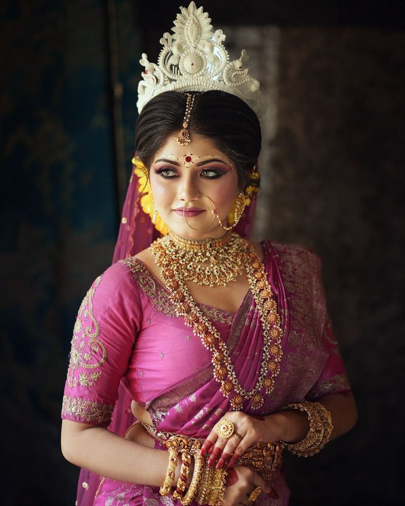 modern bengali bridal look in pink saree