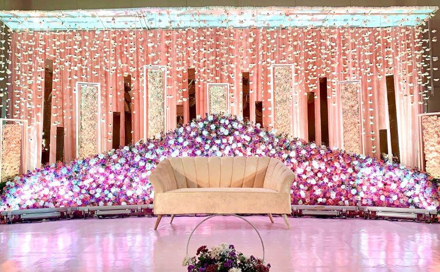 white peach and pastel pink stage decoration 