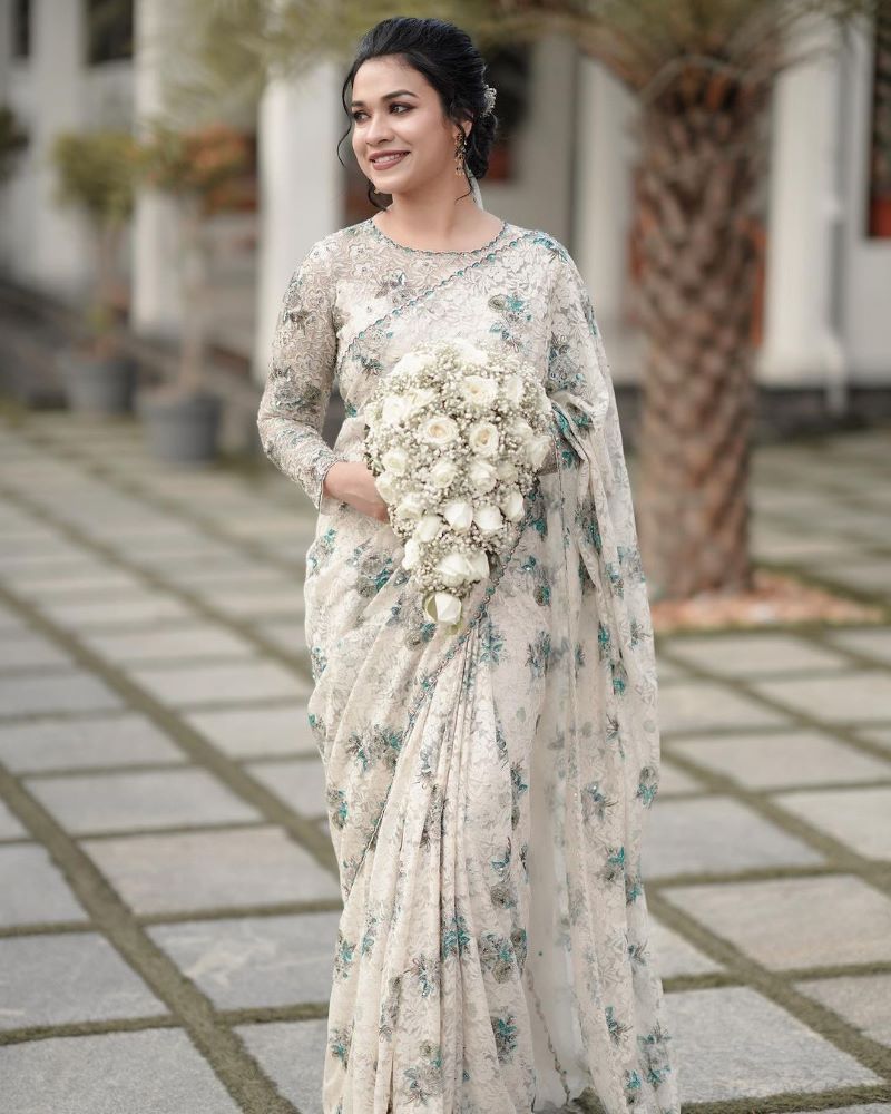 elegant and modern floral lace saree with veil 