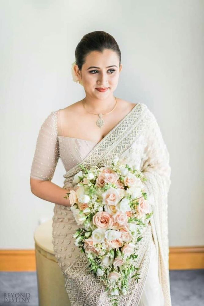 white and silver bridal saree with rhinestones and sequins