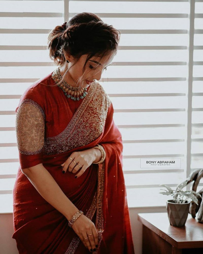 christian kerala bride in red saree