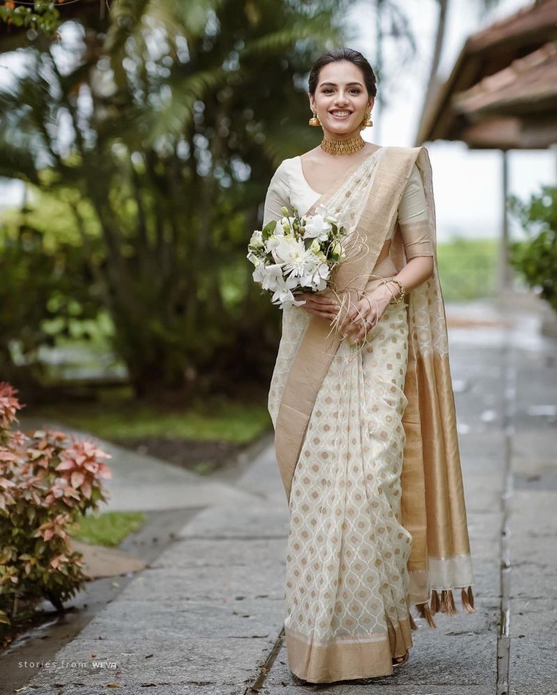 simple cream golden silk saree for tamil christian brides